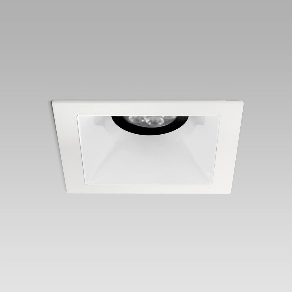 Recessed ceiling downlight for interior lighting with protruding frame and white optic