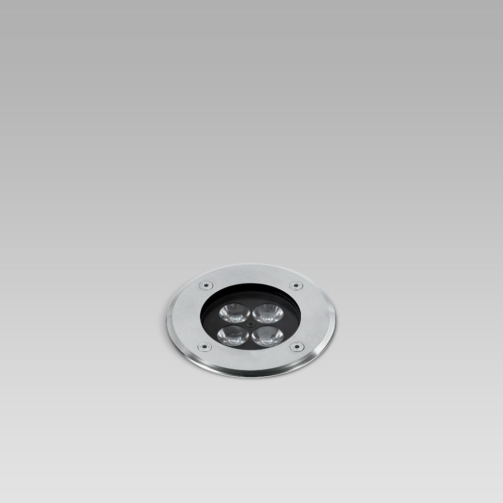 In-ground recessed luminaire for outdoor lighting, requiring shallow installation depth, available with different trims
