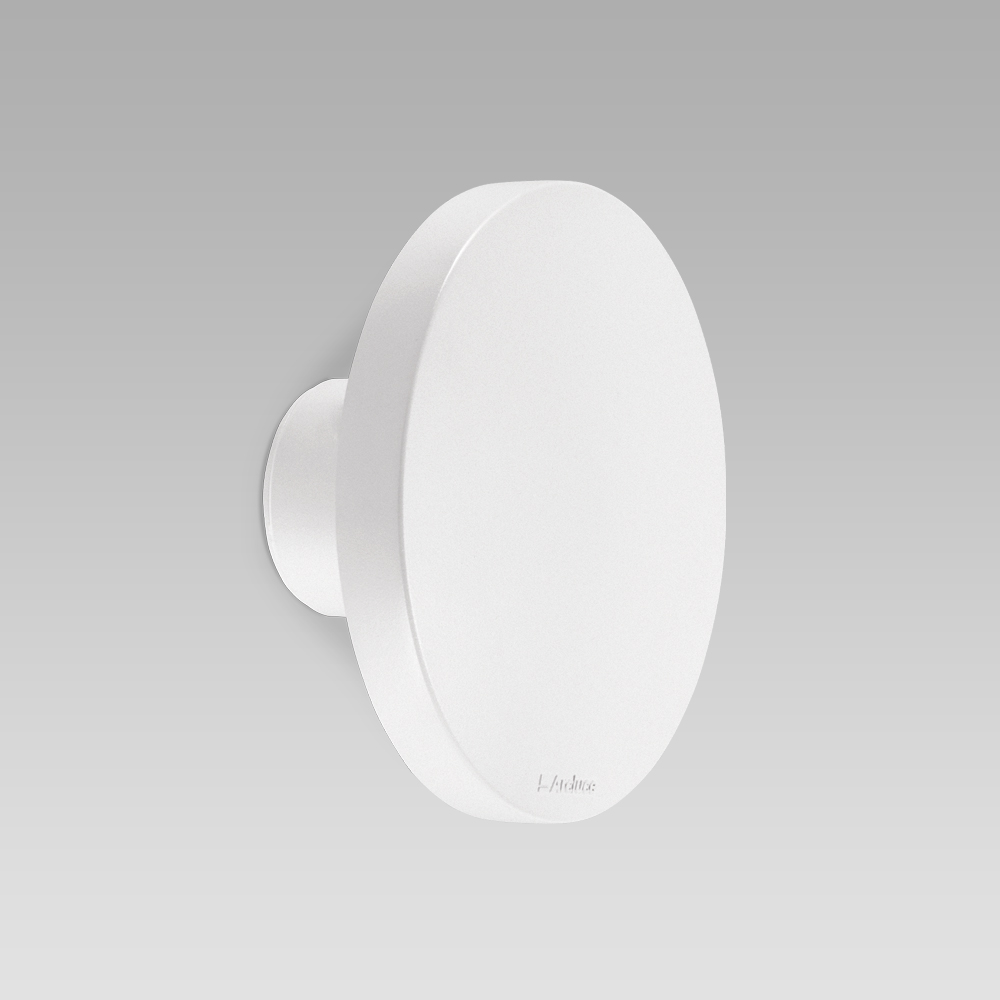 Wall-mounted luminaire for facade lighting with sophisticated design and radial optic, for a diffused and elegant lighting
