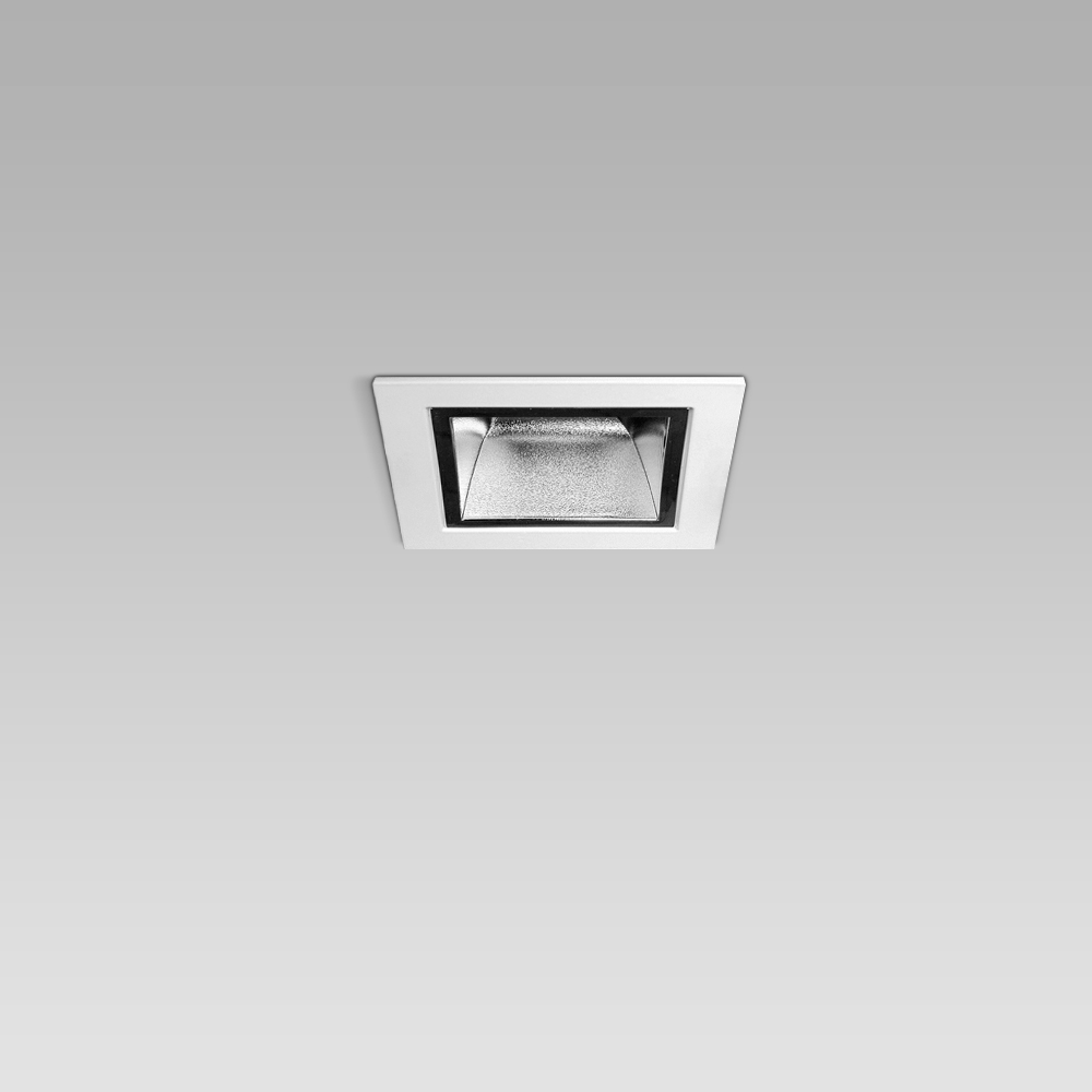 Ceiling recessed luminaire with a compact, squared design and chrome-plated optic