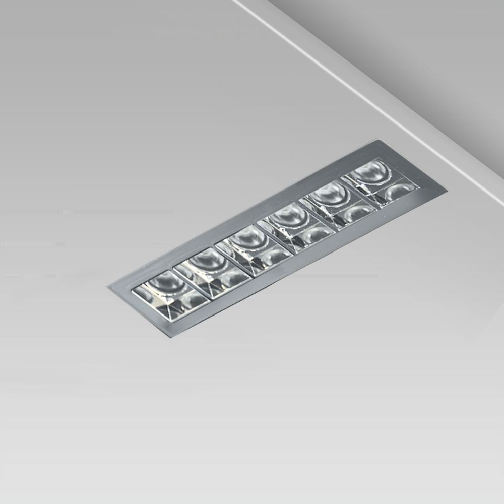 Linear ceiling recessed downlight with a minimalist design for indoor lighting, trimless and with UGR<16 metalized square optic